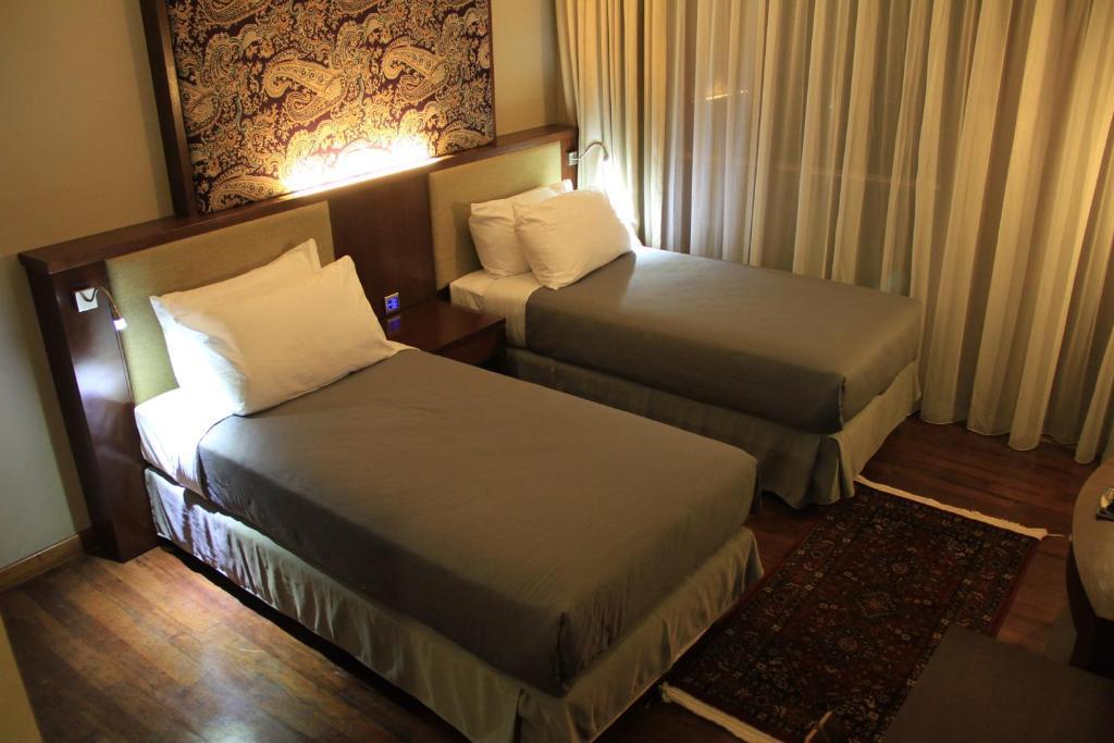 House Sangkuriang Hotell Bandung Rum bild